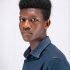 Young African man in formal attire studio portrait